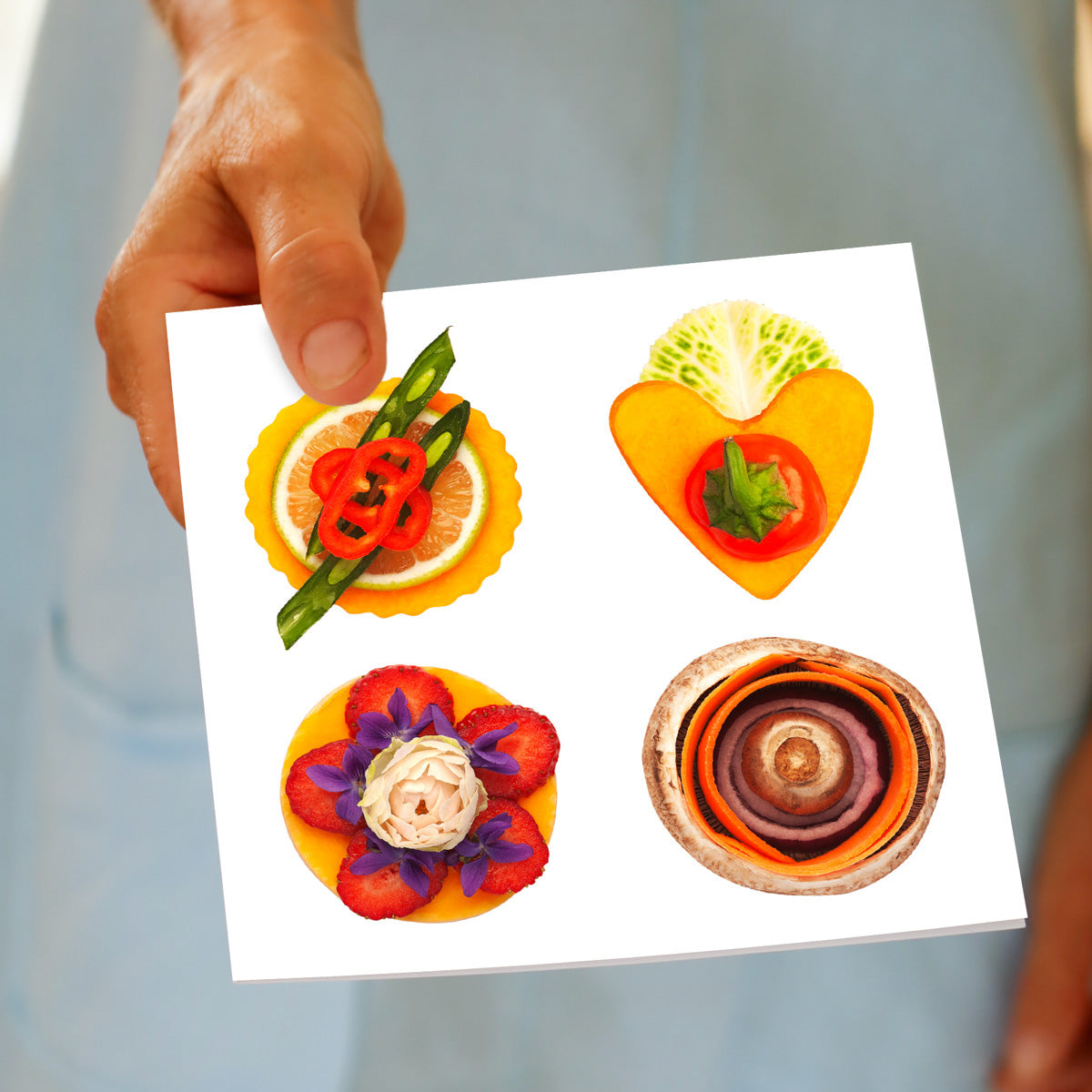 Hand held image of a fun canapés square greeting card. Found at Golly Gosh Creations.