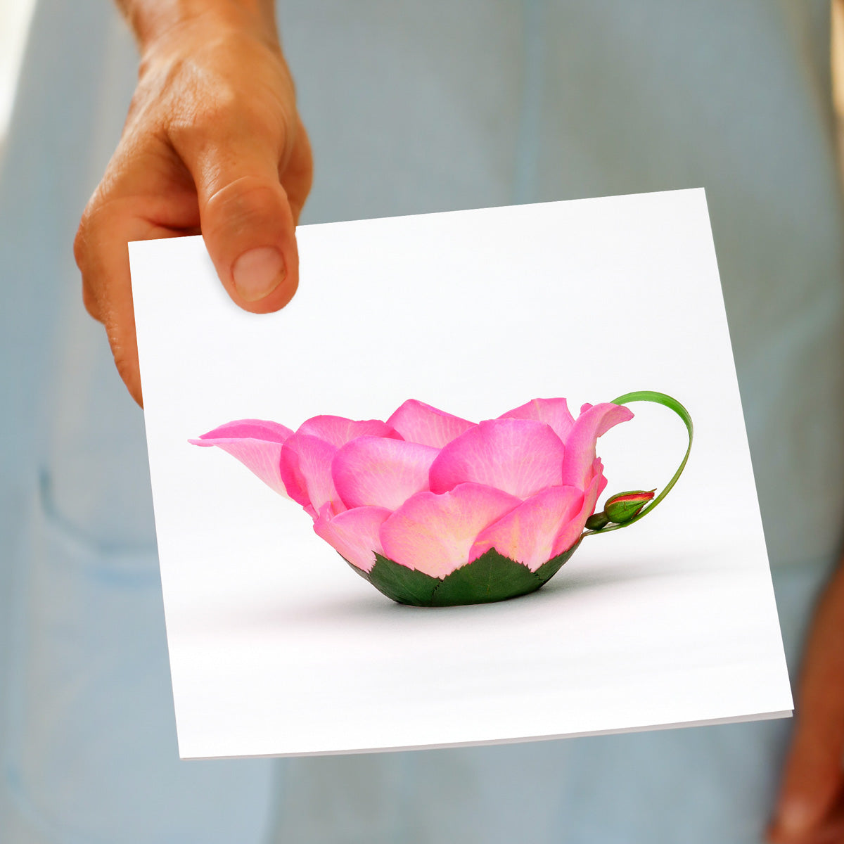 A rose petal jug greeting card from Golly Gosh Creations. Size 142 x 142 mm. Created from vibrant pink rose petals and a dainty bud.