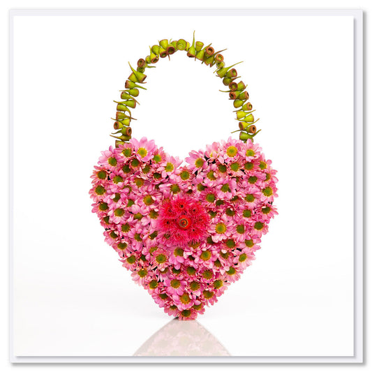 A dainty chrysanthemum heart greeting card. Created from sweet pink chrysanthemum flowers. This generous square card is from Golly Gosh Creations.