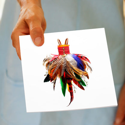 A feather dress greeting card being hand held by a model. Available from Golly Gosh Creations. Size 142 x 142 mm