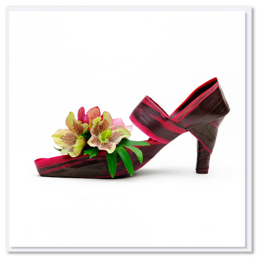 A helleborus flax shoe greeting card found at Golly Gosh Creations. Crafted from graceful  flax leaves and a pretty helleborus flower. Size 142 x 142 mm 