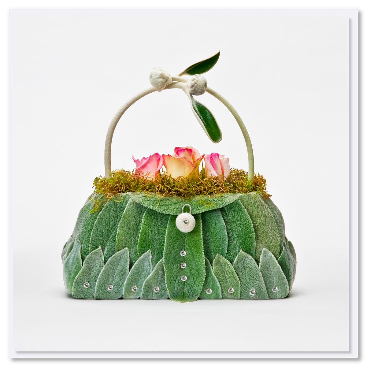 This lambs ear bag greeting card is created from soft velvety lambs ear leaves with pretty flowers. Found at Golly Gosh Creations. Size 142 x 142 mm.