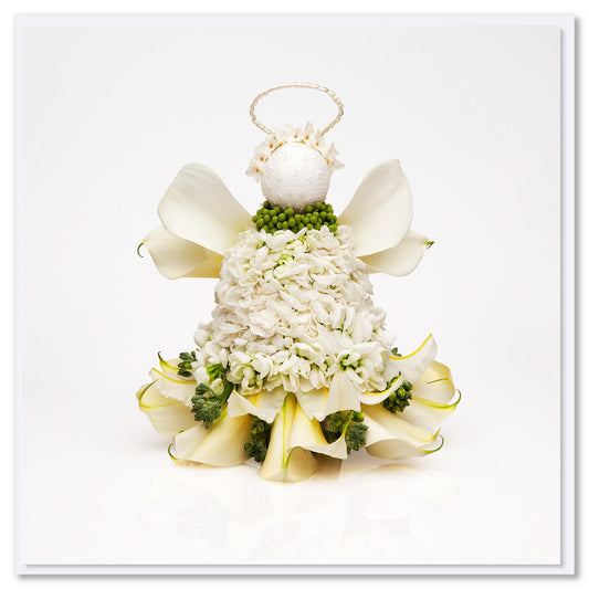 A white lily flower Christmas angel  greeting card from Golly Gosh Creations. Created from fresh flowers on a white background. Size 142 x 142 mm