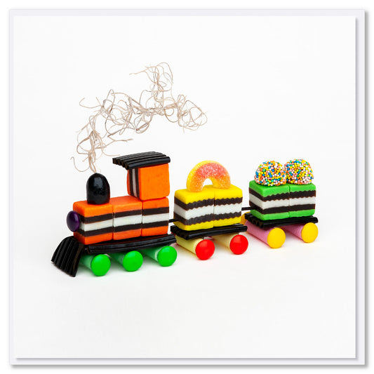 This liquorice allsorts train is from Golly Gosh Creations. A brightly coloured fun creation made from sweet confectionery. Size 142 x 142 mm