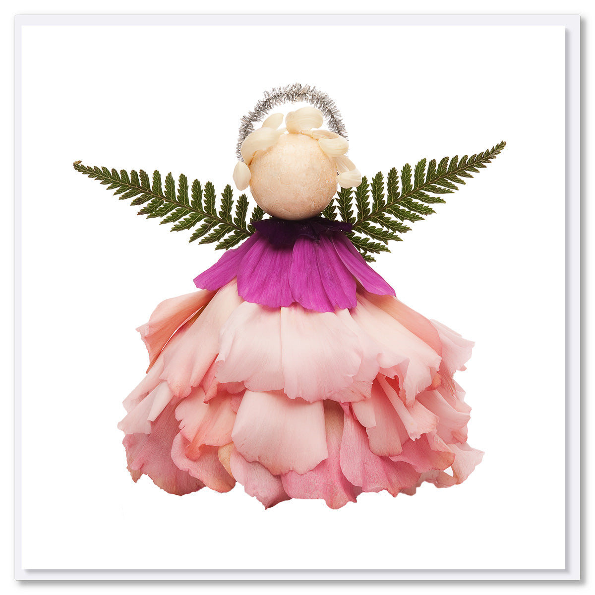 A dainty pink rose Christmas flower angel created from fresh flowers on a white background. This quality square greeting card is found at Golly Gosh Creations.