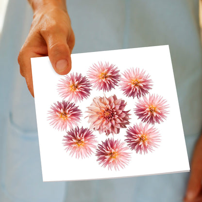 A hand held pink dahlia circle greeting card from Golly Gosh Creations. This generous square card has a circle of breathtaking soft pink dahlias.