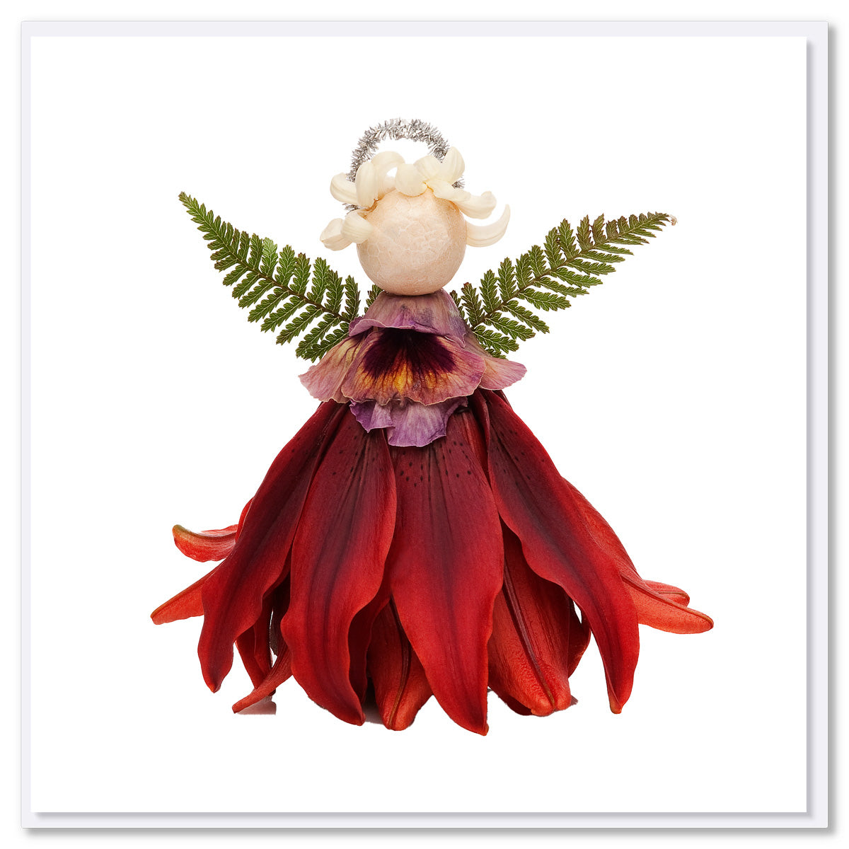 A pretty red lily flower angel Christmas card from Golly Gosh Creations. Created from fresh flowers on a white background. Size 142 x 142 mm