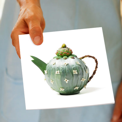 A hand held silver leucadendron teapot greeting card from Golly Gosh Creations. A quality square card created from soft leucadendron leaves.
