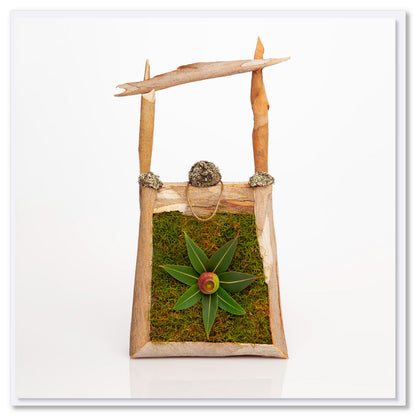 A unique eucalyptus tree bark and leaf bag greeting card from Golly Gosh Creations. Created from real foliage it sits on a white background.
